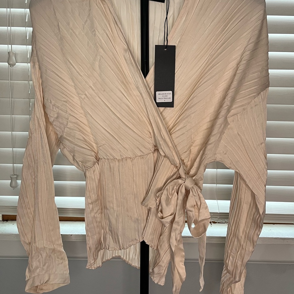 Vacate the label by Anthropologie